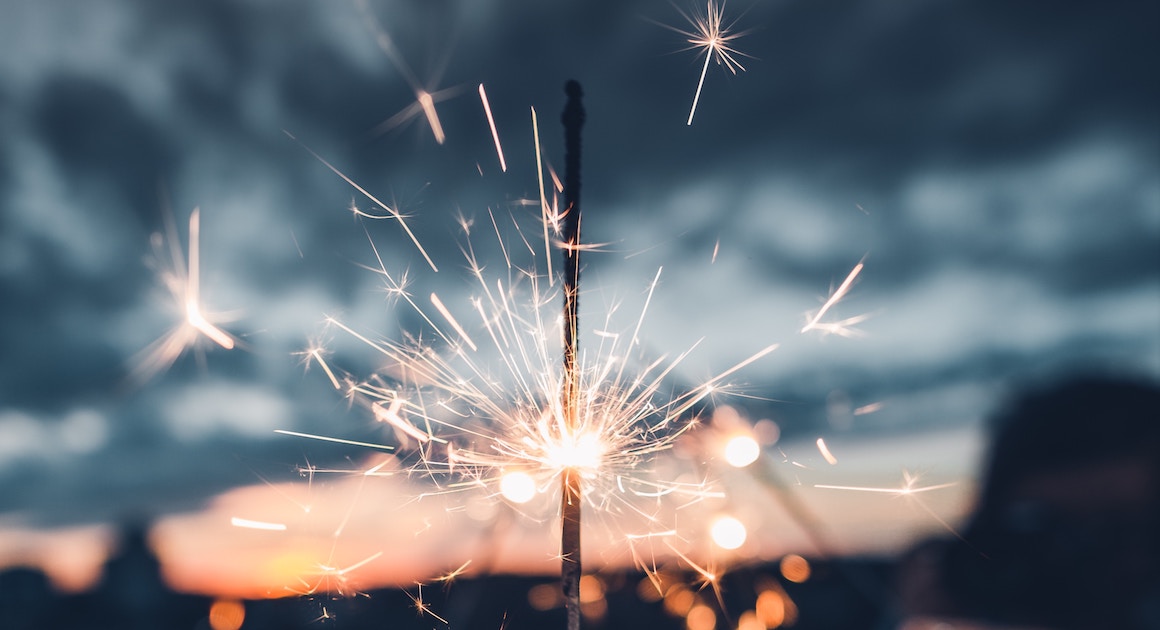 a sparkler against a sky