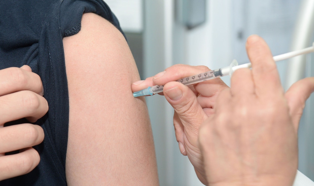 giving an immunization in an arm